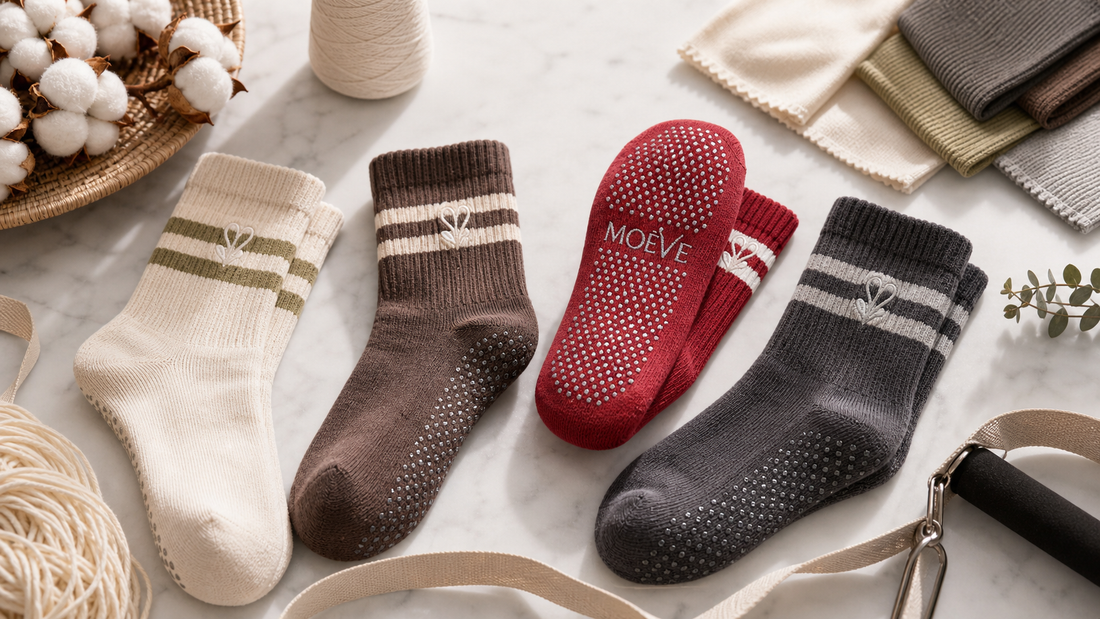 MOÉVE Pilates grip socks styled with premium fabric swatches and material details