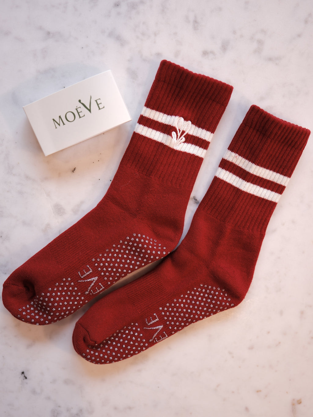 Pomegranate Red pilates grip socks by MOÉVE