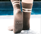 Brown pilate grip socks with white stripes